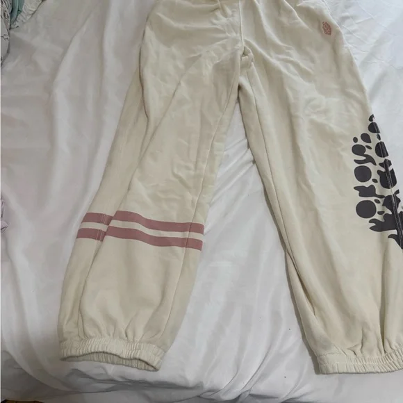 Free People Movement All Star Logo Pants in a cream color. - Picture 7 of 9